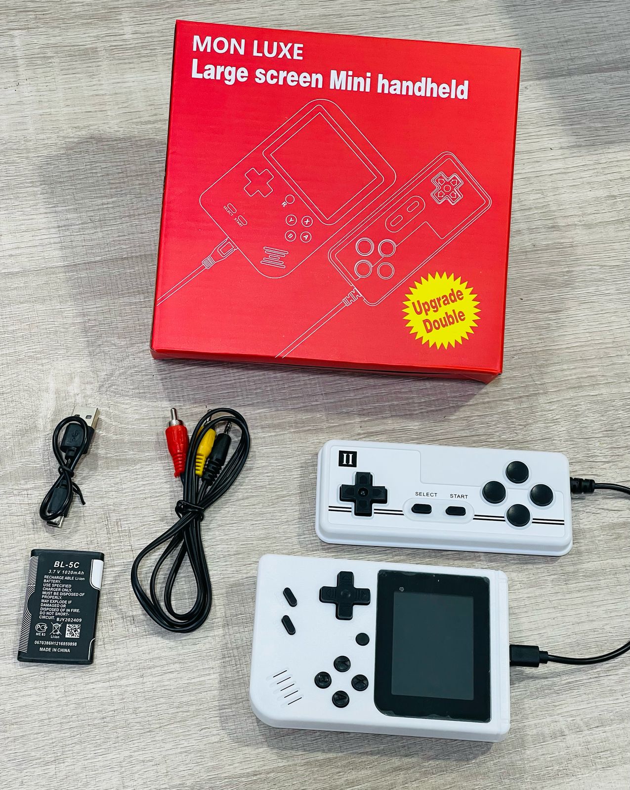 Mini (Handheld game console) جهاز ألعاب