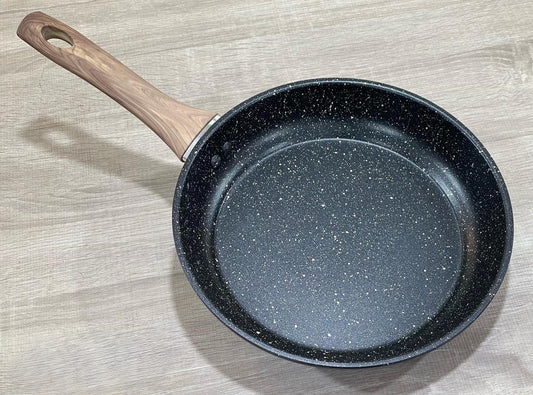 Poêle  مقلاة